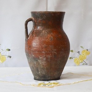 Rustic terracotta vase. Antique clay primitive vessel. Wabi sabi pottery indoor planter.