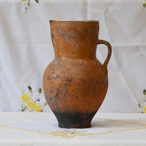 Large primitive clay vessel. Wabi sabi pottery tall vase. Antique terracotta plant pot.