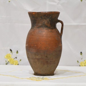 large antique outdoor planter. Old terracotta primitive clay vessel. Wabi sabi pottery vase