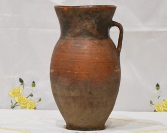 large antique outdoor planter. Old terracotta primitive clay vessel. Wabi sabi pottery vase