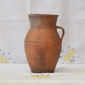 Wabi sabi pottery antique pitcher. Antique terracotta plant pot. Brown primitive clay vessel.