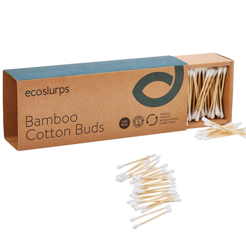 May include: A box of 500 bamboo cotton buds with a green leaf logo and the text "ecoslurps Bamboo Cotton Buds". The box is made of brown cardboard and has a blue and green design. The cotton buds are made of bamboo and have white cotton tips.