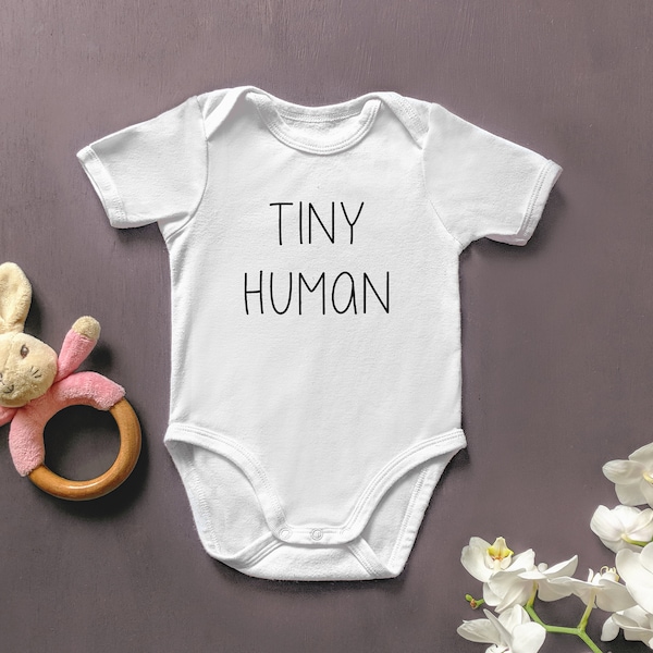 Pequeño traje de cuerpo de bebé humano. Pelele Novely para recién nacido. regalo de la ducha de bebé