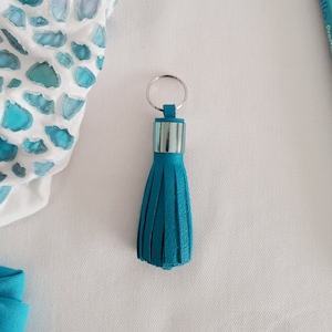 Turquoise leather key ring. Fringed key ring. Pompom key ring.