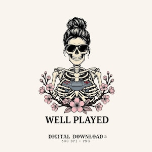 May include: A graphic illustration of a skeleton with a hair bun wearing black sunglasses, holding a grey video game controller, surrounded by pink cherry blossoms. The text below reads WELL PLAYED, DIGITAL DOWNLOAD, 300 DPI + PNG.