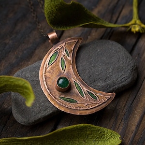 handmade copper moon necklace with green aventurine and green leaves painting