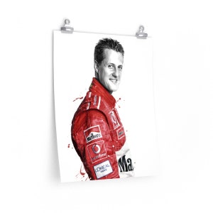 May include: A black and white illustration of a racing driver wearing a red racing suit with sponsor logos, including Marlboro, Vodafone, and L'Oreal Paris.