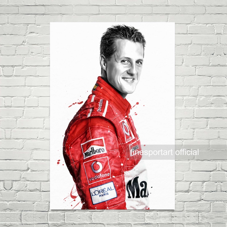 May include: A black and white illustration of a racing driver wearing a red racing suit with sponsor logos, including Marlboro, Vodafone, and L'Or&eacute;al Paris. The driver is smiling and looking to the right. The background is white with splashes of red paint.