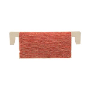 May include: A red and beige woven fabric cushion with a wooden frame. The cushion is attached to the frame with metal clips.