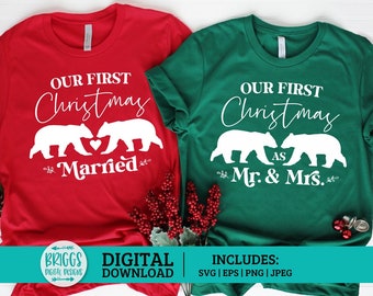 May include: Two red and green t-shirts with a Christmas theme. The red shirt says "Our First Christmas Married" with a couple of bears holding a heart. The green shirt says "Our First Christmas as Mr. & Mrs." with a couple of bears.