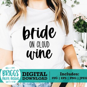 May include: White t-shirt with black text that reads "bride on cloud wine". The shirt is being worn by a person. The image also includes a teal blue banner with the text "BRIGGS DIGITAL DESIGNS DIGITAL DOWNLOAD Includes: SVG | EPS | PNG | JPEG"