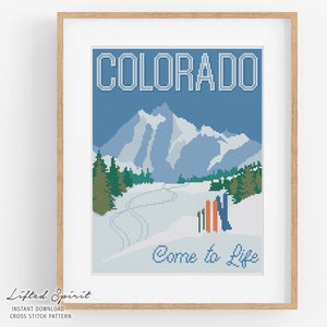 May include: A cross stitch pattern featuring a vintage-style travel poster for Colorado. The poster depicts a snowy mountain scene with ski slopes and the text "Colorado Come to Life".