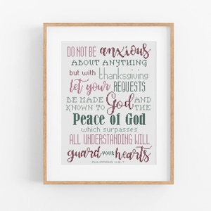 May include: A framed cross-stitch wall art piece featuring the text: Do not be anxious about anything but with thanksgiving let your requests be made known to God and the peace of God which surpasses all understanding will guard your hearts Philippians 4:6-7.