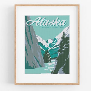 May include: A vintage-style poster with the text "Alaska, The Last Frontier" in a blue and white font. The poster features a scenic view of a mountain range with a river flowing through it.