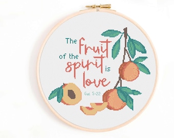 May include: Cross stitch pattern featuring peaches and the text "The fruit of the spirit is love, Gal 5:22".