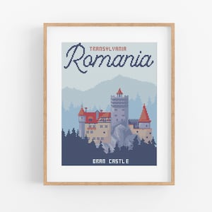 May include: A vintage-style travel poster featuring a pixelated illustration of Bran Castle in Transylvania, Romania. The poster has a blue background with a mountain range in the distance and the text "Transylvania Romania" and "Bran Castle" in white.
