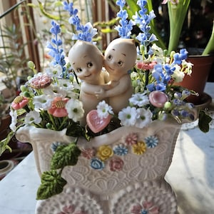 Napco Baby Carriage Planter with Kewpies, Buttons and Faux Baby&#39;s Breath