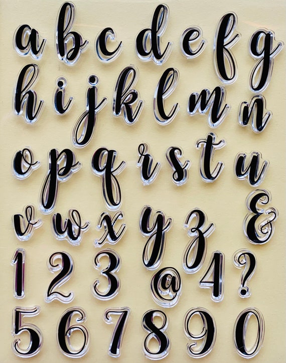 Letras y números del alfabeto en cursiva. diseño de tipo de letra