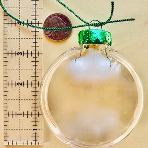 1 Large Empty Hard Plastic Round ORNAMENT for filling String Ornament and top Fillable 4 Inch Wide 1 inch Thick