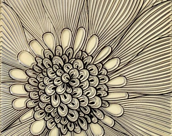 May include: A black and white abstract floral design with a central cluster of overlapping circles and a radiating pattern of lines.