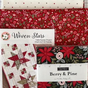 May include: A collection of Christmas-themed fabric, including red floral, green floral, and white polka dot patterns. A table runner project with a star design is shown, along with a fabric bundle labeled "Berry & Pine". Finished size is 14.5" x 44.5".