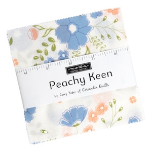 May include: A white fabric square with a peach, blue, and green floral pattern. The fabric is labeled "Peachy Keen" by Corey Yoder of Coriander Quilts.
