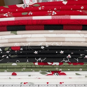 May include: A set of three ceramic mugs with a speckled, matte finish. The mugs are in shades of cream, light gray, and dark gray. Each mug has a simple, modern design and a rounded handle. Perfect for coffee or tea.