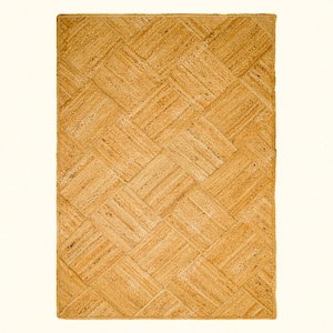 May include: A natural fiber woven rug with a light brown color and a diamond pattern.