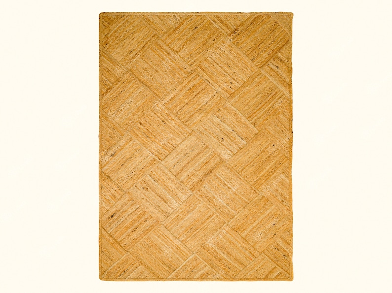May include: A natural fiber woven rug with a light brown color and a diamond pattern.