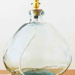 Clear handmade recycled glass table base with linen flex. Recommend our 35cm - 40cm handmade lampshade. Height 39cm - width 33cm