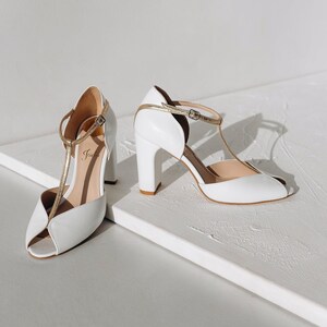 White Wedding Shoes with Golden T-Strap and High Block Heel, Retro Bridal Pumps with Open Peep Toe, Vintage Leather Shoes with Ankle Strap