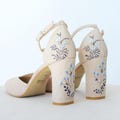 Ivory Bridal Sandals with Handmade Embroidery, Wedding Shoes with V-Notched Vamp, Almond Toe and Ankle Strap, Bridal Shoes with Block Heel product logo