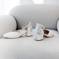 White Bridal Sandals with Handmade Embroidery, Wedding Shoes with V-Cut Vamp, Almond Toe and Ankle Strap, Bridal Shoes Low Block Heel product logo