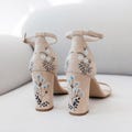 Pinky White Bridal Sandals with Handmade Embroidery, Wedding Shoes with Open Peep Toe, Almond Toe, Ankle Strap, Bridal Shoes with Block Heel product logo
