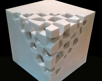White marble cube sculpture created out of pure white marble - Magic cube