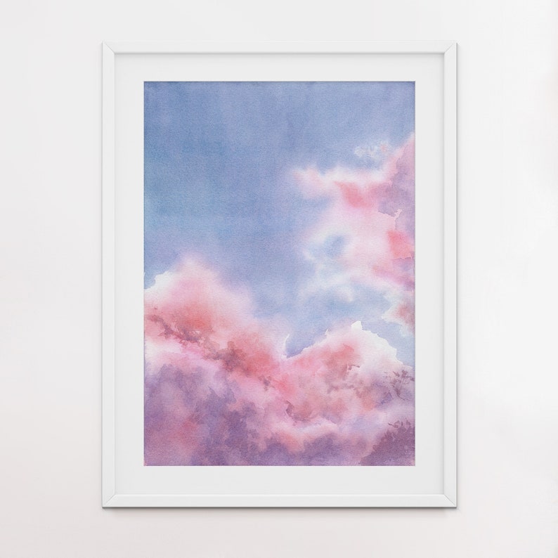 Puede incluir: Pintura acuarela de un cielo nublado rosa y morado. Las nubes son suaves y esponjosas, y el cielo es azul claro.