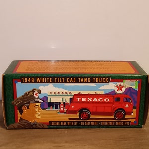 A boxed ERTL Collectibles 1949 White Tilt Cab tank Texaco Truck