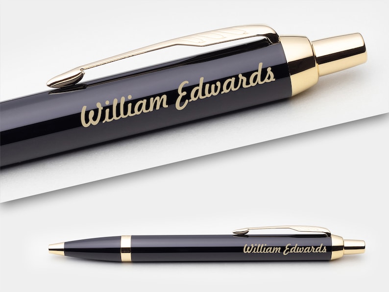 May include: A black and gold pen with the name "William Edwards" engraved on the side.