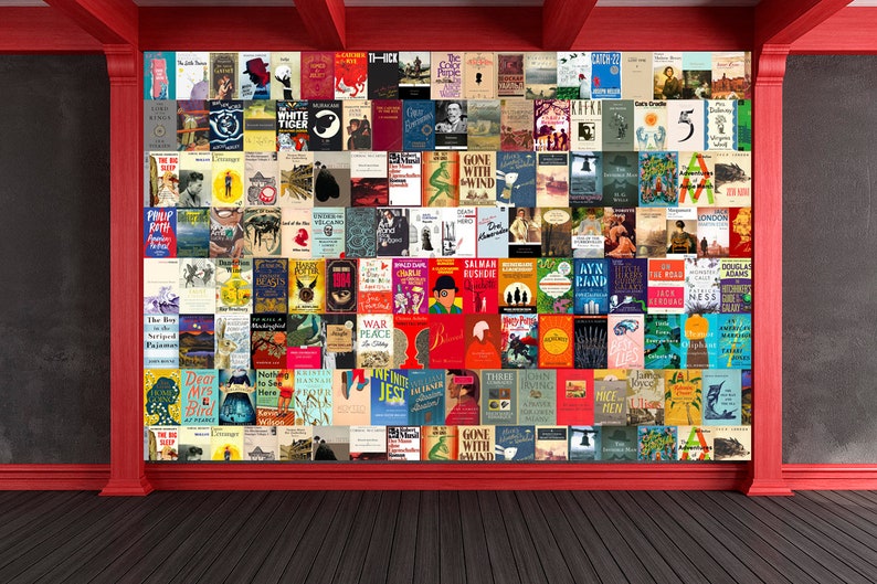 May include: A wall covered in book covers, featuring a variety of titles and authors. The wall is painted red and has a red trim. The floor is made of dark wood.