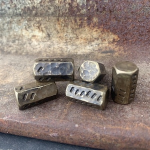 Hexagonal brass dice