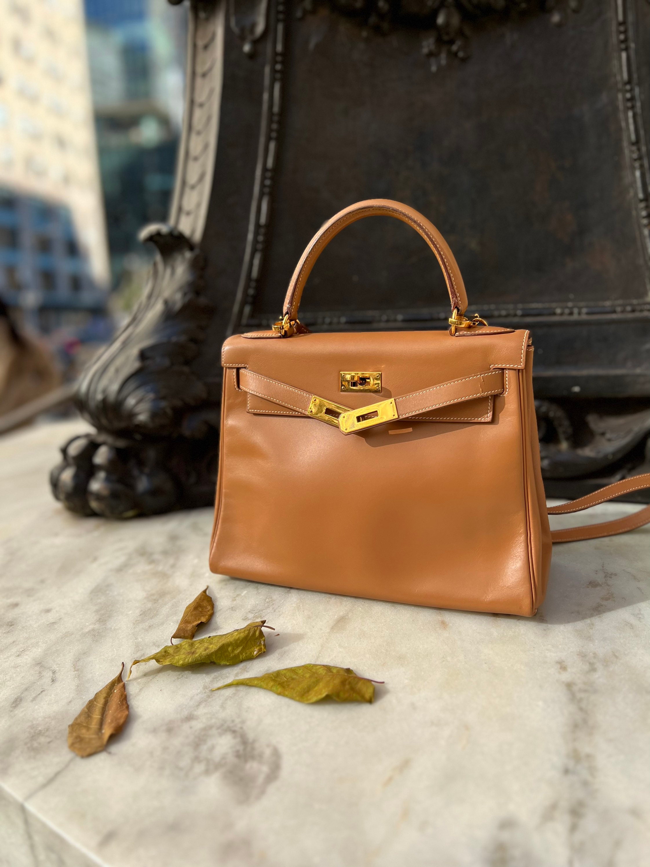 POWERED BY BUSINESS.Hermes Cognac Ostrich Birkin 30