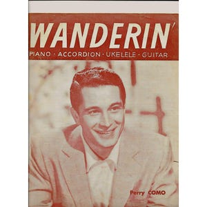 May include: A vintage sheet music cover featuring a smiling man in a suit. The title of the song is "Wanderin'" and the music is for piano, accordion, ukulele, and guitar. The artist is Perry Como.