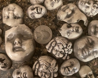 Random creepy doll bits. Set of 12