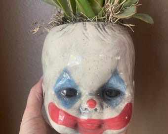 Clown baby head flower pot