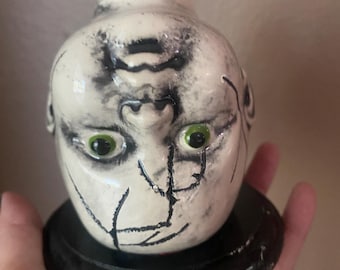 Doll head curio statue ceramic
