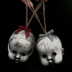 Doll head holiday ornament