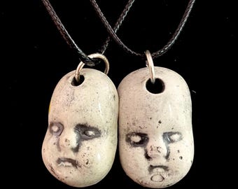Ceramic spooky baby doll  head necklace