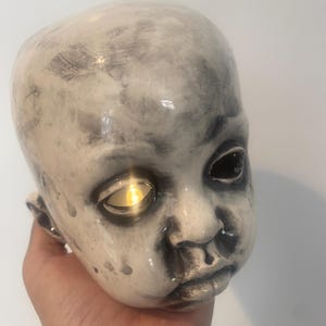 Spooky Baby head candle holder