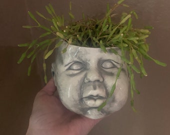 Ceramic baby head planter