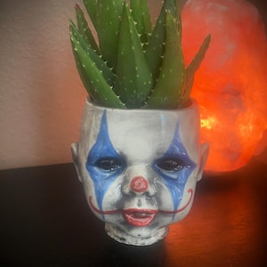 Clown baby head flower pot